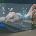Manos de una persona tecleando un ordenador, representando la digitalización de la facturación electrónica con la Ley 32-23